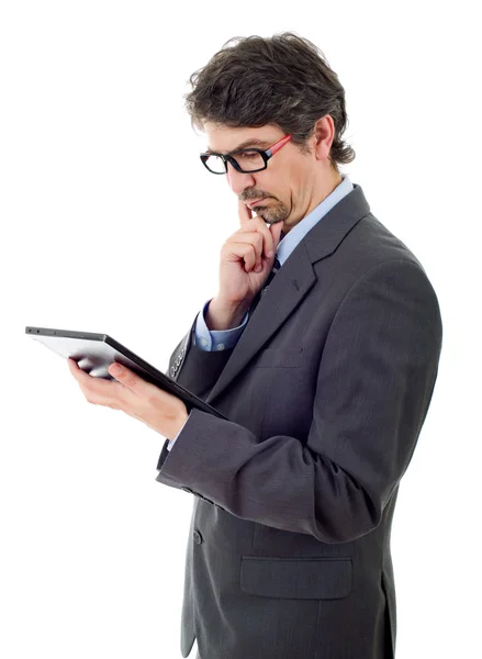 Joven hombre de negocios con una tableta PC, aislado — Foto de Stock