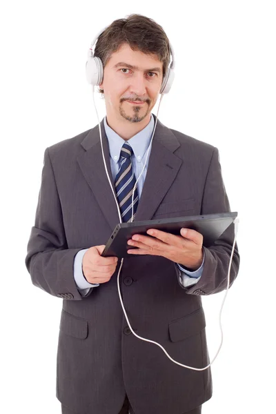 Empresário trabalhando com tablet pc e fones de ouvido, isolado — Fotografia de Stock