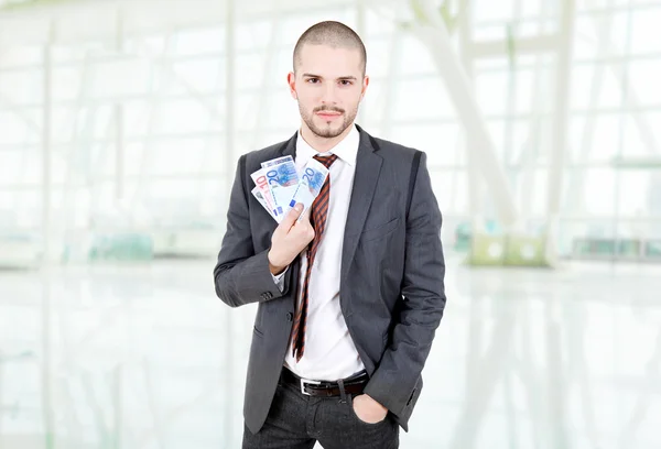 Feliz joven hombre de negocios con dinero, en la oficina — Foto de Stock