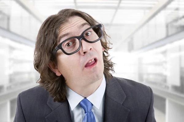 Young silly business man at the office — Stock Photo, Image