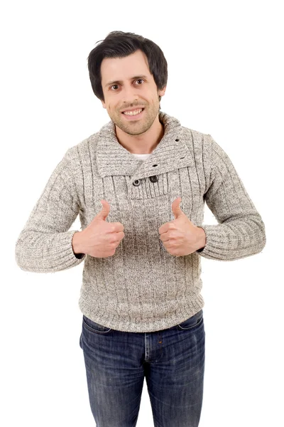 Young casual man going thumbs up, isolated on white background — Stock Photo, Image