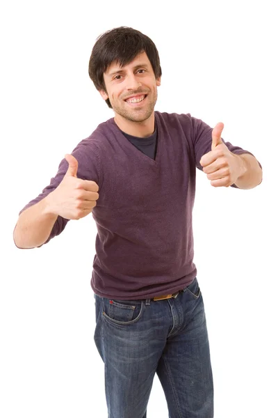 Young casual man going thumbs up, isolated on white background — Stock Photo, Image