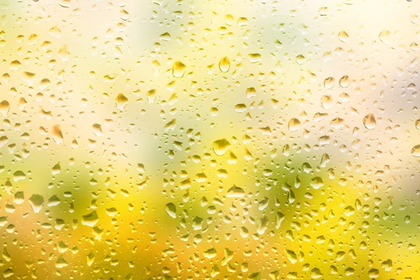 Glass surface with water drops in a rainy day — Stock Photo, Image