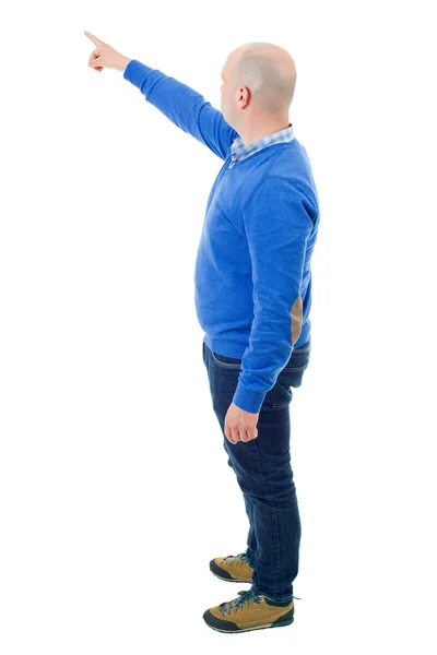 Young casual man full body, pointing, isolated on a white background — Stock Photo, Image