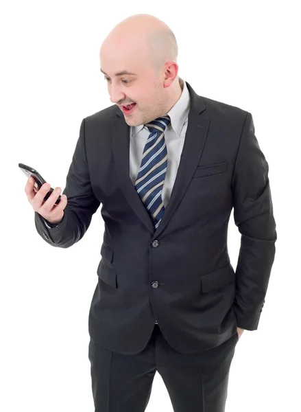 Silly businessman surprised with a cellphone. Isolated on white — Stock Photo, Image