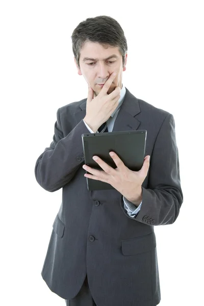Giovane uomo d'affari che lavora con un tablet pc, isolato — Foto Stock