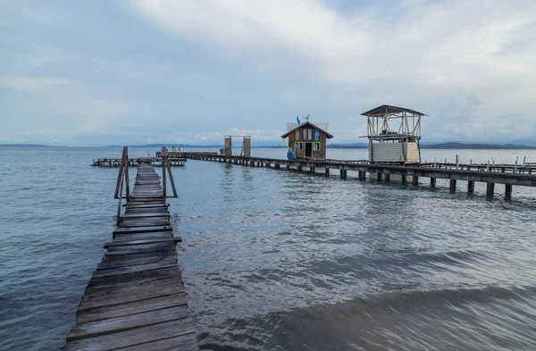 Caribbean houses over the sea with wooden dock on stilts, Bocas del Toro, Panama — Stock Image Caribbean Houses Sea Wooden Dock Stilts Bocas Del Toro Panama Stock Image