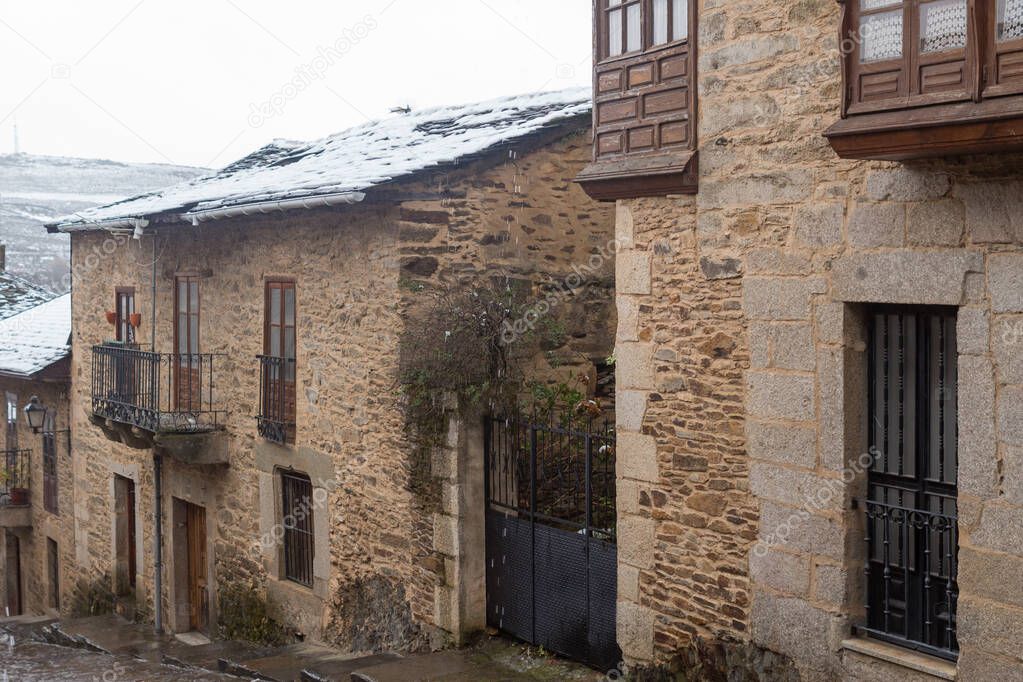 Old houses of Puebla de Sanabria with snow, Castilla y Leon, Spain