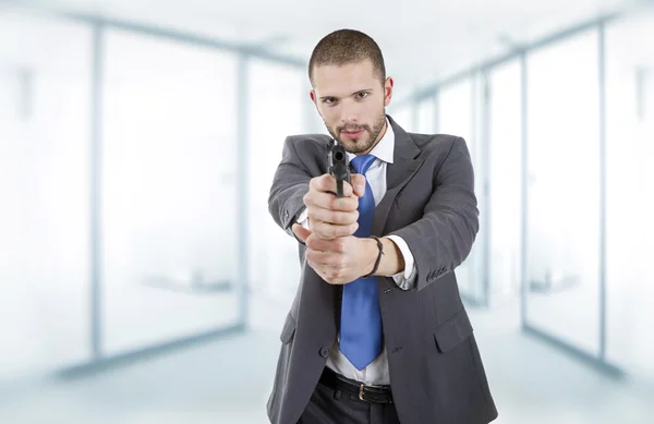 Businessman with a gun — Stock Photo, Image