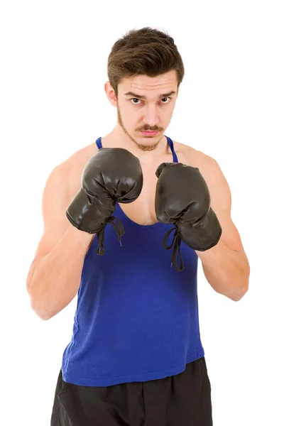 Мужчина бьет черными боксерскими перчатками на белом фоне . — стоковое фото