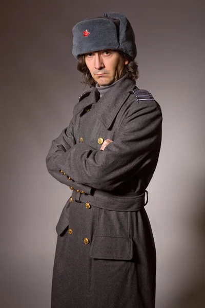 Young man dressed as russian military, studio picture — Stock Photo, Image