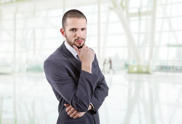 Young business man thinking at the office — Stock Photo, Image