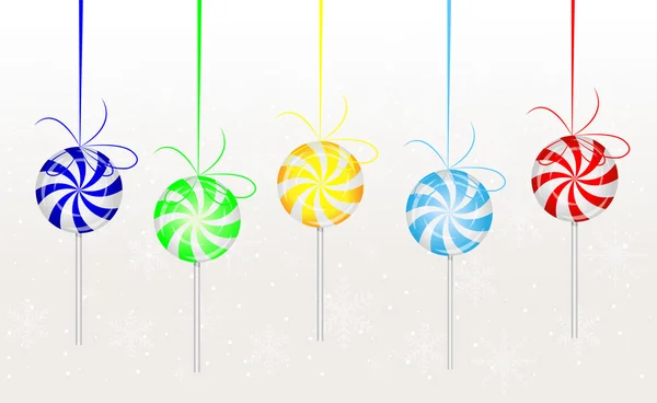 Candies lollipops hang on a white background — Stock Vector