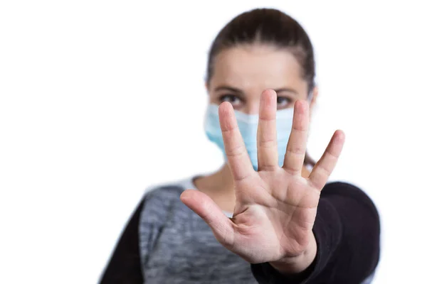 Ung Flicka Medicinsk Mask Hålla Avståndet Med Handen Isolerad Vit — Stockfoto