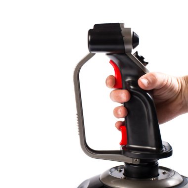 joystick uçak konsolu bir beyazın üzerinde izole edilmiş. joystick 'i tetikleyen çocuk eli.