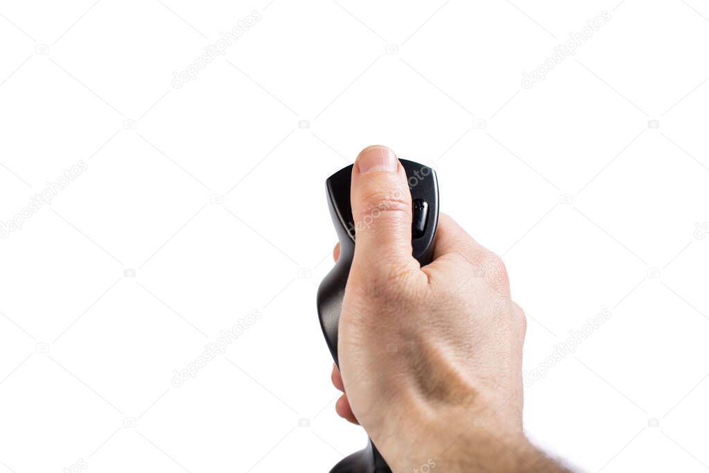 Hand holding joystick for aircraft games isolated on a white with copy space.