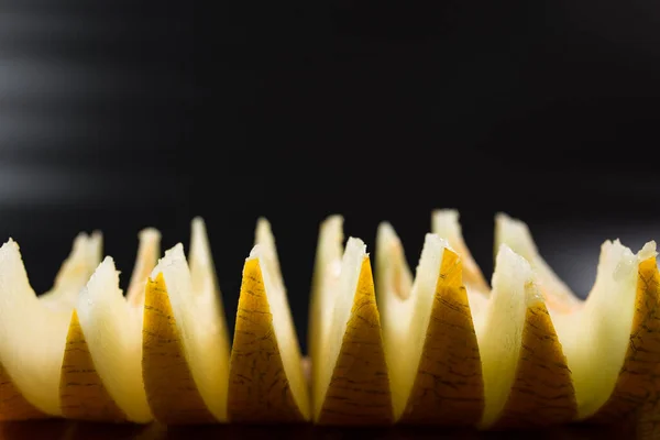 Sweet Yellow Melon Cut Wedges Close Black Background — Stock Photo, Image