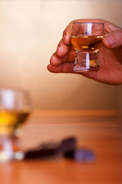 Drinking cognac with chocolate — Stock Photo, Image