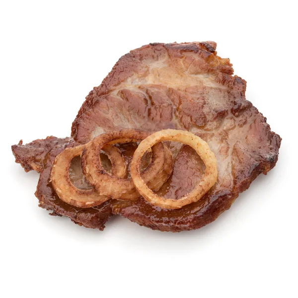 Мясо жареной свинины с ломтиками лука — стоковое фото