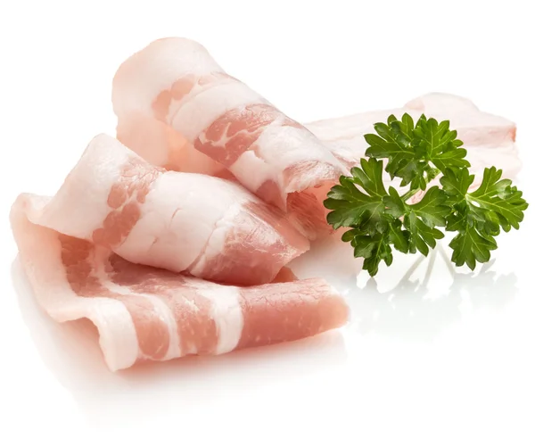 Sliced bacon and parsley leaves — Stock Image Sliced bacon and parsley leaves Royalty Free Stock Images