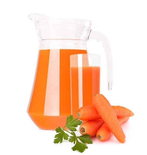 Carrot juice in glass jug — Stock Photo, Image