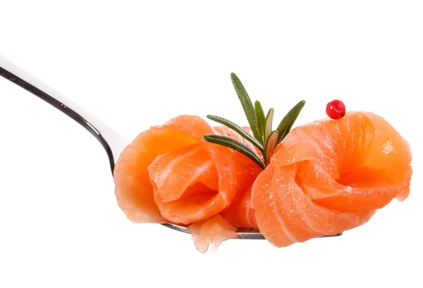 Salmon pieces on fork — Stock Photo, Image