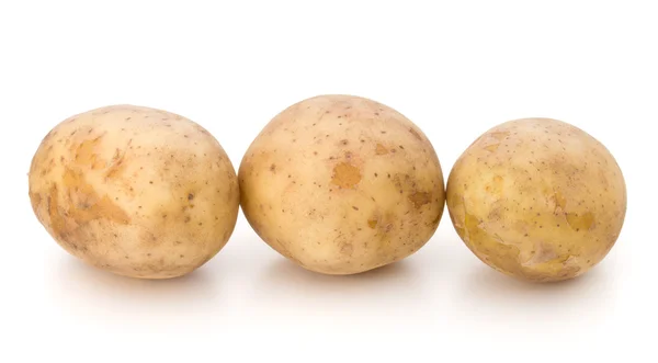 Три новых картошки — стоковое фото