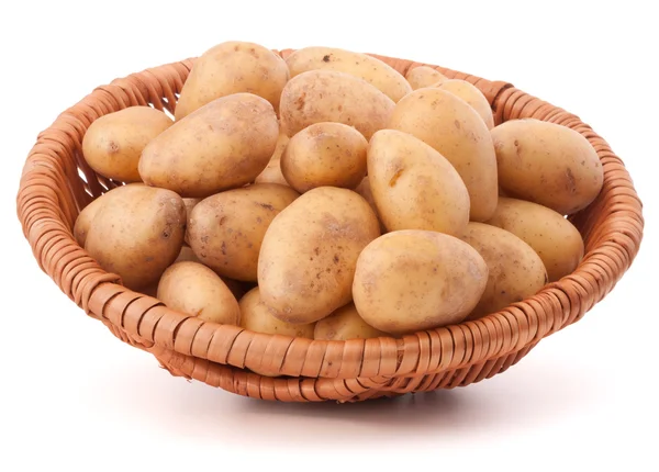 Potato tubers in wicker basket — Stock Photo, Image