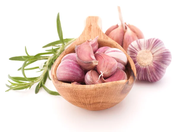 Garlic cloves in wooden bowl — Stock Photo, Image