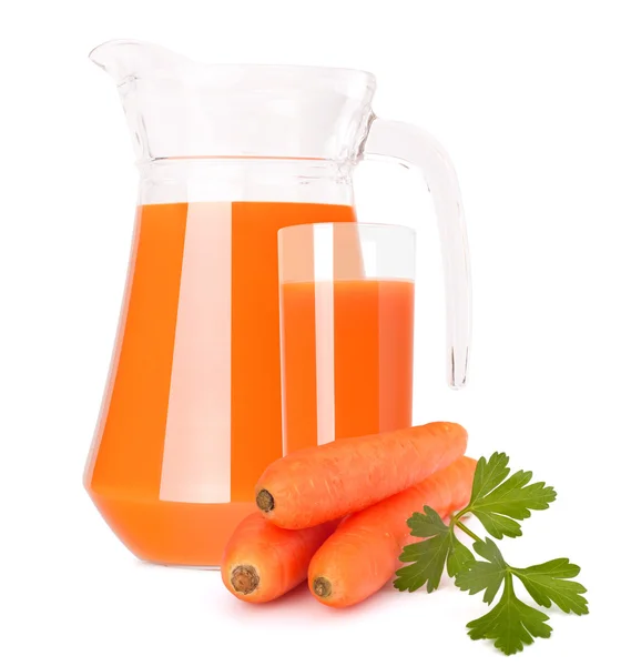 Carrot vegetable juice in glass jug — Stock Photo, Image