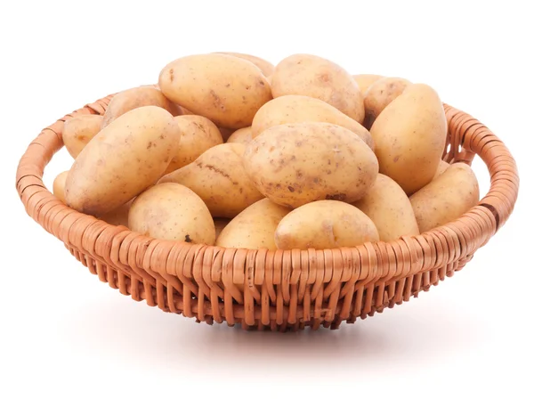 Potato tuber in wicker basket — Stock Photo, Image