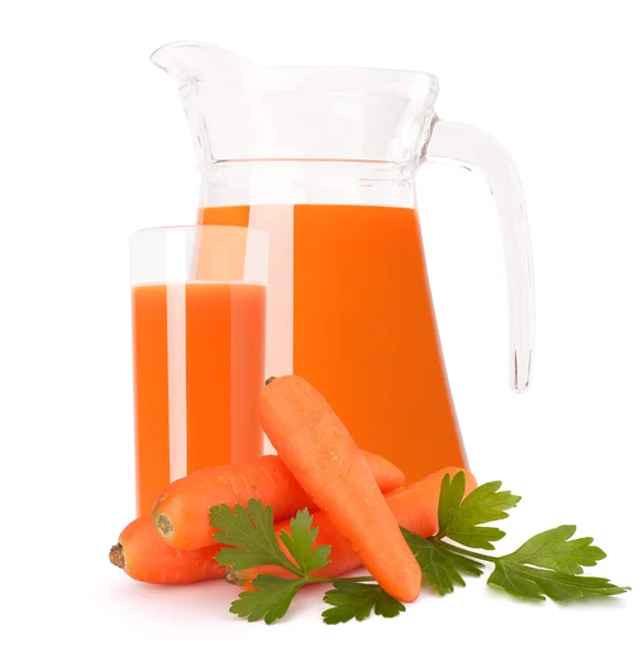 Carrot vegetable juice in glass jug — Stock Photo, Image