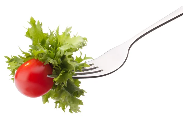 Fresh salad and cherry tomato on fork — Stock Photo, Image