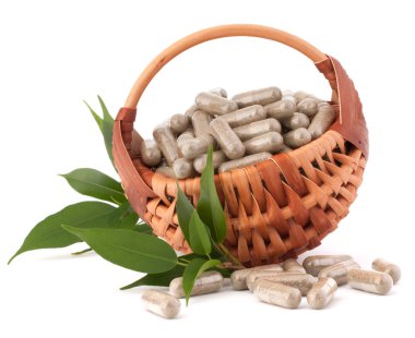 bitkisel ilaç kapsül'sepet içinde.