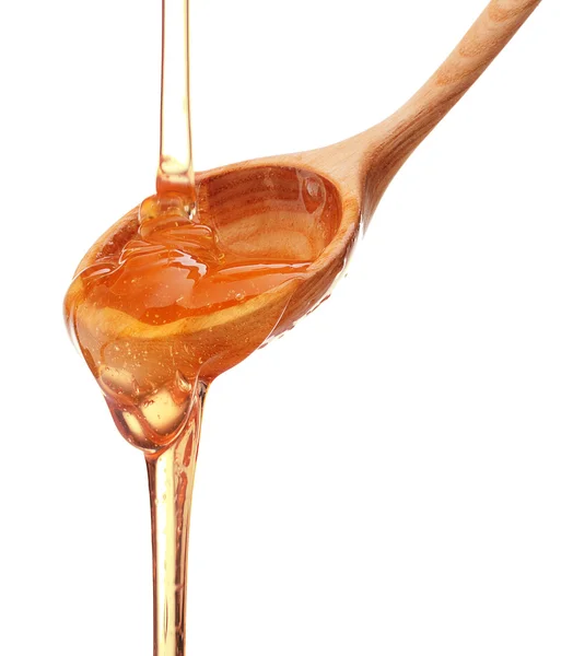 Honig tropft aus einem hölzernen Honigwagen — Stockfoto