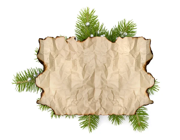 Parchment paper on Christmas tree branch — Stock Photo, Image