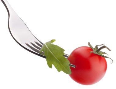 Çatal üzerinde rucola salata ve kiraz domates