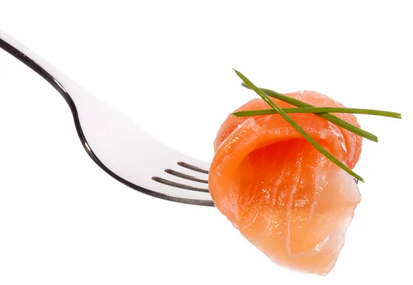 Salmon piece on fork — Stock Photo, Image