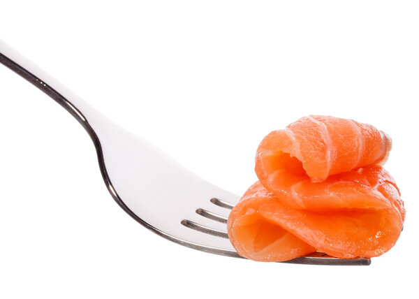 Salmon piece on fork