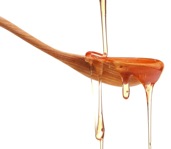 Honung droppar från Honey Dipper — Stockfoto