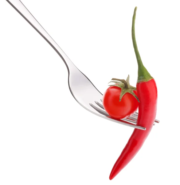 Kirsebærtomat og chilipepper på gaffel – stockfoto