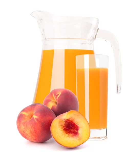 Peach juice in glass jug — Stock Photo, Image