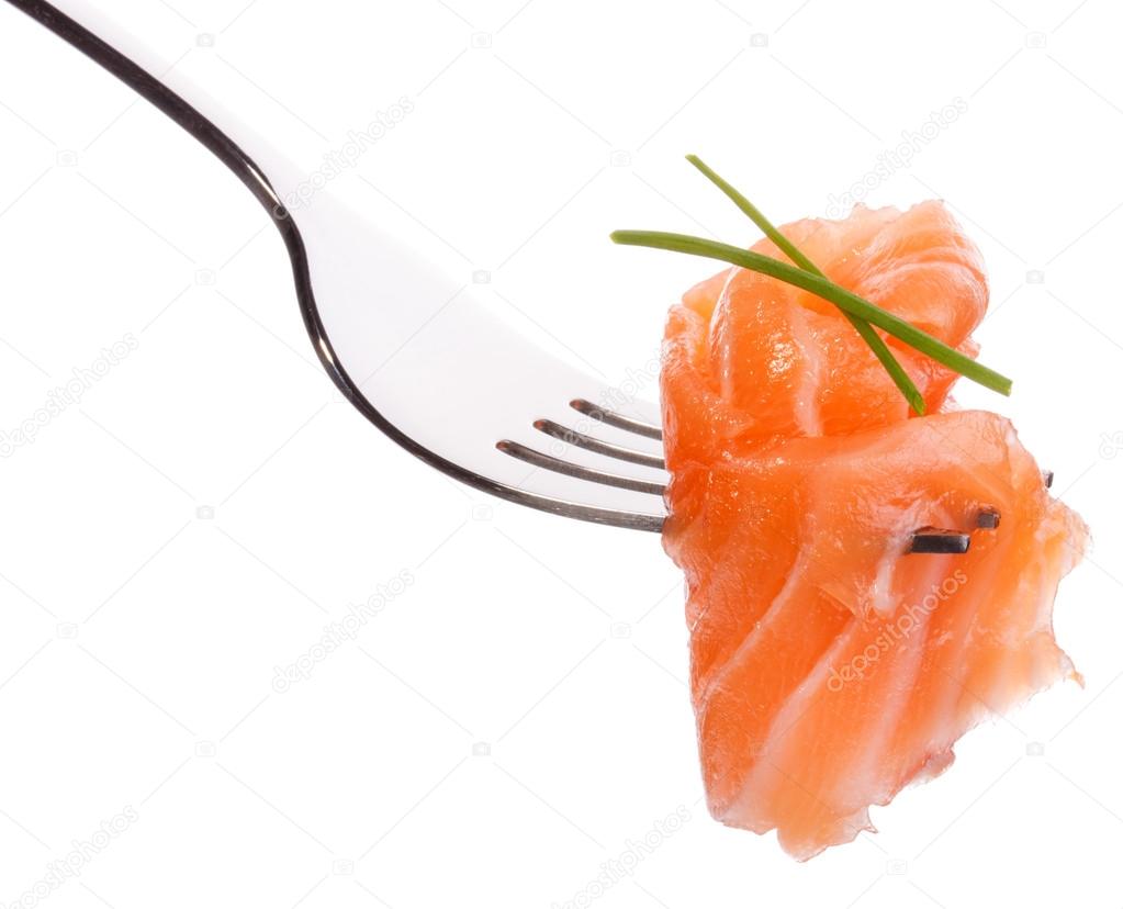 Salmon piece on fork
