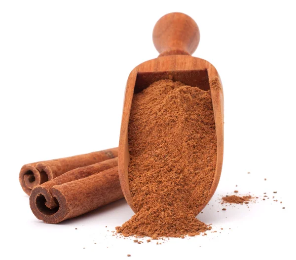 Cinnamon powder in wooden spoon — Stock Photo, Image