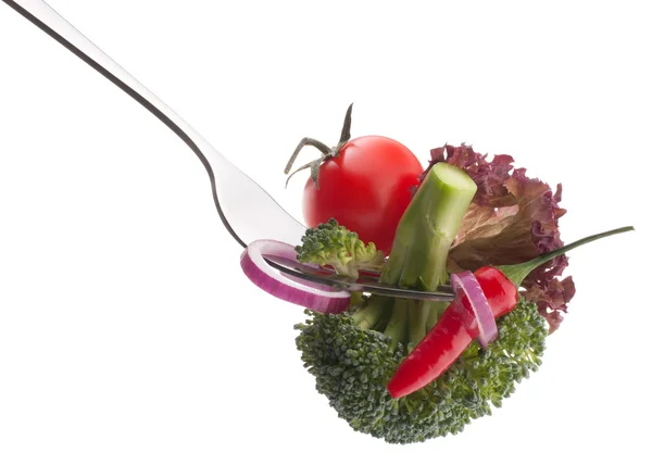 Fresh raw vegetables on fork — Stock Photo, Image