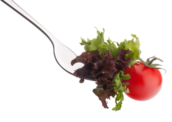 Ensalada y tomate en tenedor —  Fotos de Stock