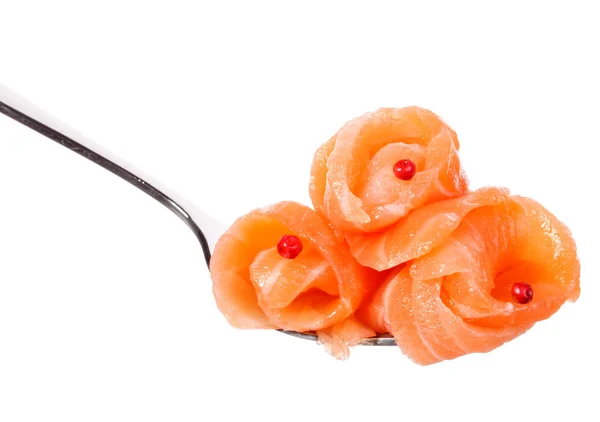 Salmon pieces on fork — Stock Photo, Image