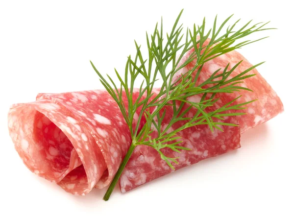 Salami sausage slices with dill — Stock Photo, Image