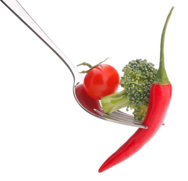 Fresh raw vegetables on fork — Stock Photo, Image