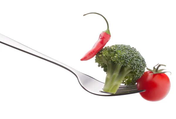 Verduras frescas crudas en tenedor —  Fotos de Stock